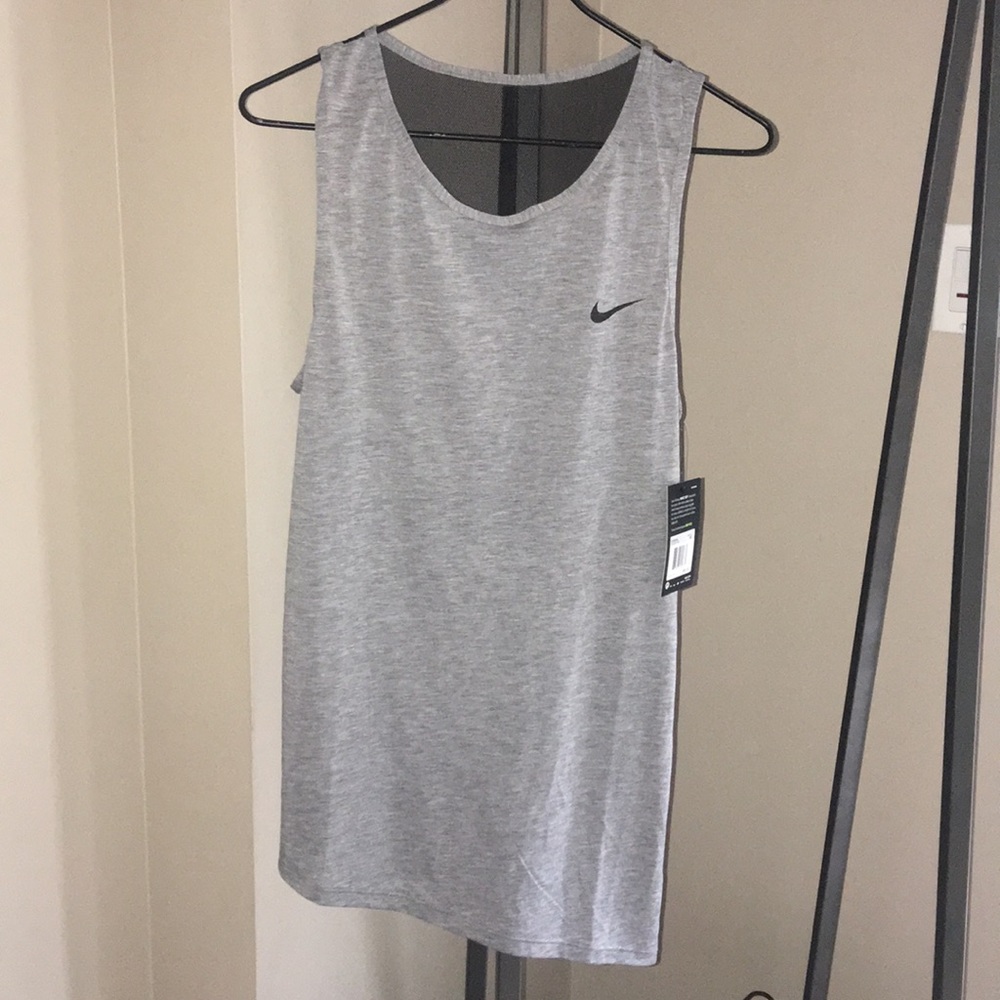 NWT Nike Dri-Fit Assymetrical hem athletic tank!